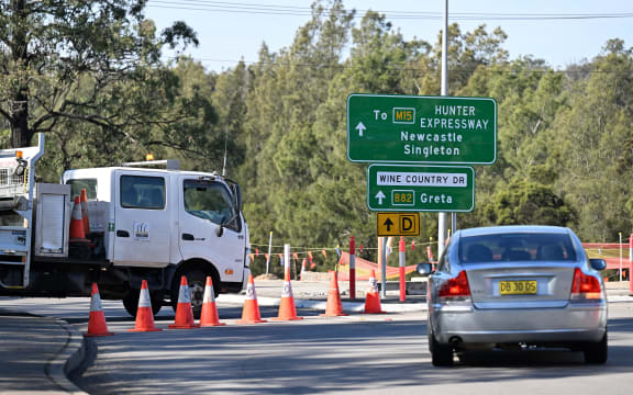 A roadblock some 500 meters from the site of a bus crash, where 10 people from a wedding party were killed, in Cessnock, in Australia's Hunter wine region north of Sydney.