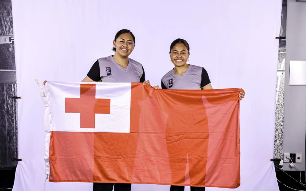 Referees Natasha (left) and Emma (right) Ah-Hing say that basketball is more than a sport; it's a way to bond and represent their Tongan roots on a global platform.