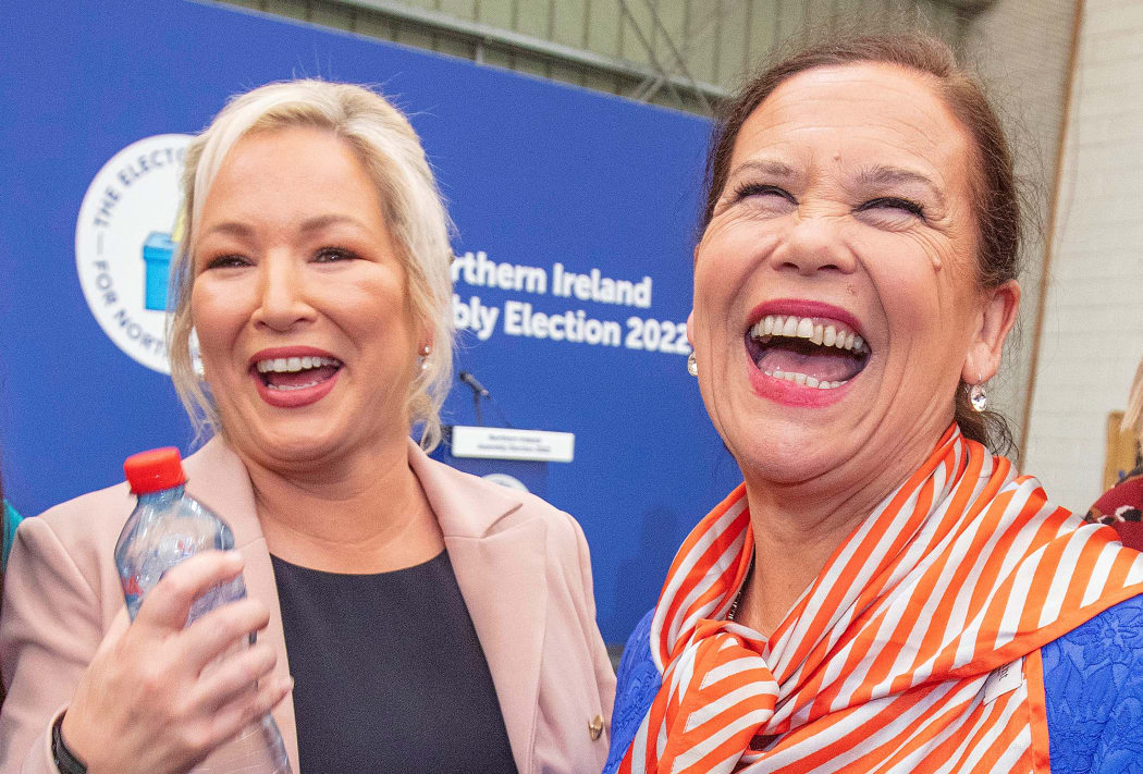 Deputy First Minister of Northern Ireland, and Irish republican Sinn Fein party Northern Leader Michelle O'Neill  reacts with part Leader Mary Lou McDonald.