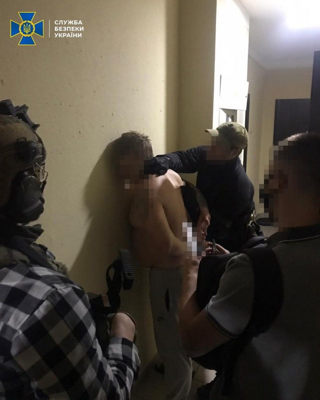 A man is arrested by the Ukranian secret service after raids on neo-Nazis in the area who were reportedly inspired by the Christchurch mosque attacker.
