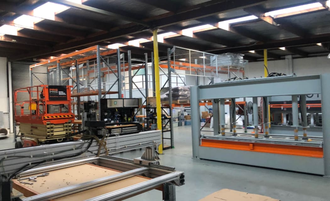 The Critical factory before a tornado wrecked havoc on its roof.