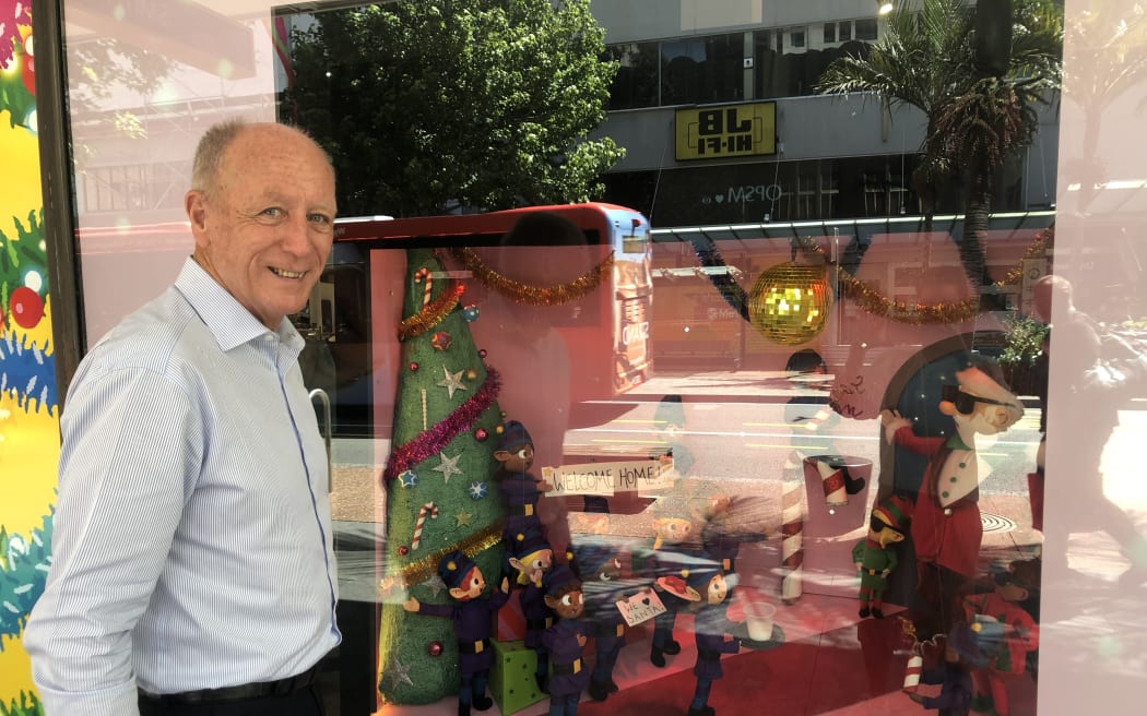 Special projects manager Kevin Broadfoot outside Smith and Caughey's Christmas window in Queen St
