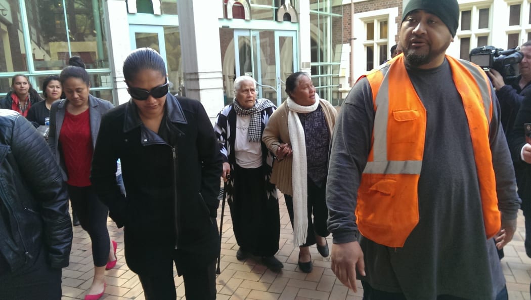 Peter Pakau's supporters leave the High Court at Auckland.