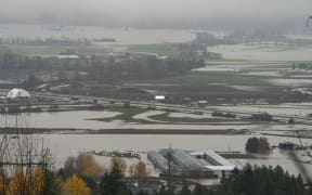 Flood water fills the Sumas area on November 18, 2021 in Abbotsford, Canada. Record rainfall this week has resulted in widespread flooding forcing residents to be evacuated from the area.