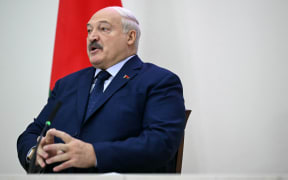 Belarusian President and presidential candidate Alexander Lukashenko meets with the media after voting in Belarus' presidential election in the capital Minsk on January 26, 2025. (Photo by Natalia KOLESNIKOVA / AFP)
