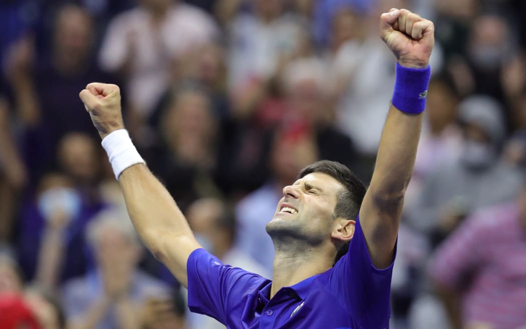 Serbia's Novak Djokovic reacts after winning his 2021 US Open Tennis tournament men's semifinal match against Germany's Alexander Zverev at the USTA Billie Jean King National Tennis Center in New York, on September 10, 2021.