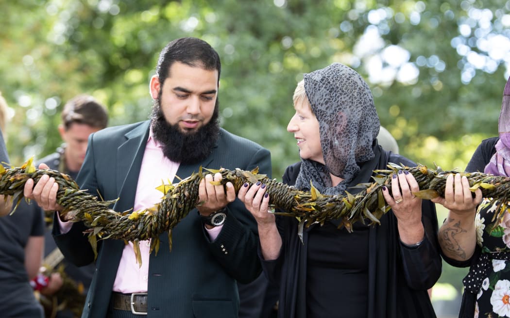 Shagaf Khan and Christchurch Mayor Lianne Dalziel during the handover of a lei at the Al Noor Mosque