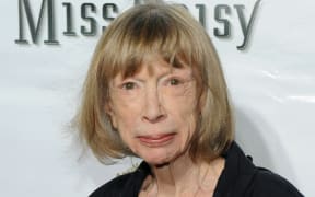 Author Joan Didion, a US literary icon credited with ushering in "new journalism" with her essays on Los Angeles life in the tumultuous 1960s, died at 87.