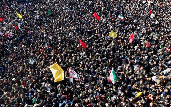 Iranian mourners gather during the final stage of funeral processions Qasem Soleimani, in his hometown Kerman.