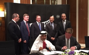 Mr Orr, pictured with his business associates in Dubai.