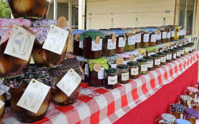 Dovecote House preserves lined up at a market stall