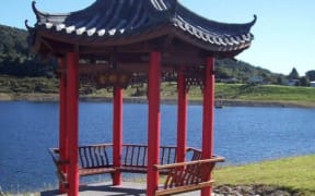 The pagoda in the Ross Memorial gardens. The lake level rose to the top of the seat when a slip changed the flow in a local creek.