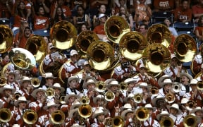massed brass band with tubas and cowboy hats