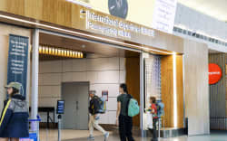 Tourists at International Departures, Auckland Airport, Dec 4.