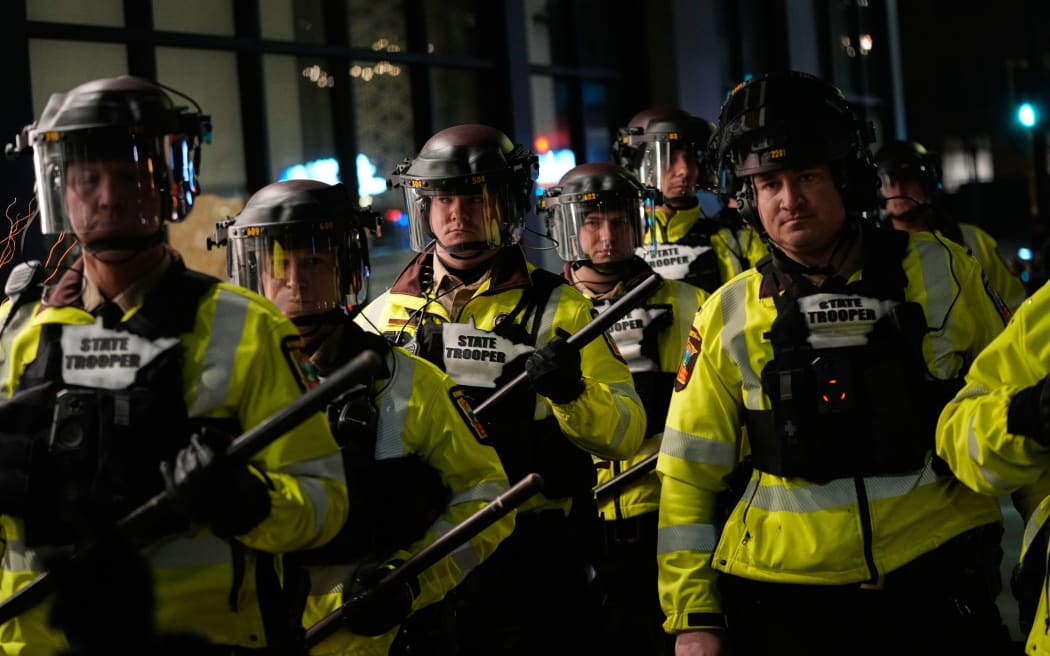 Minnesota State Patrol officers are seen during a protest and noise demonstration calling for an end to federal immigration enforcement operations in the city, in Minneapolis on January 9, 2026.