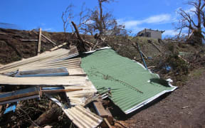A handout photo taken on 23 February, 2016 and obtained on 24 February, shows damage to a school dormitory on Koro Island as aid arrives and the clean-up starts after the most powerful cyclone in Fiji's history battered the Pacific island nation.