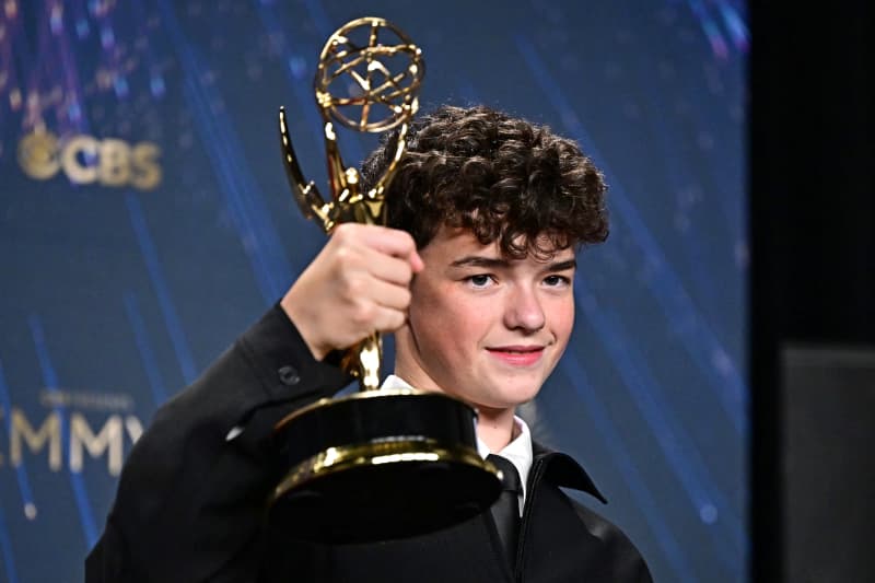 British actor Owen Cooper poses in the press room with the award for Outstanding Supporting Actor in a Limited or Anthology Series or Movie for "Adolescence" during the 77th Primetime Emmy Awards at the Peacock Theatre at LA Live in Los Angeles on September 14, 2025.