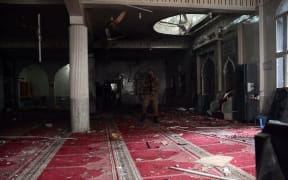 Inside view of the Shia mosque in northwestern at a Shia mosque in the northwestern city of Peshawar, Pakistan, on March 4, 2022. A suicide bomber blew himself up during weekly Friday prayers.