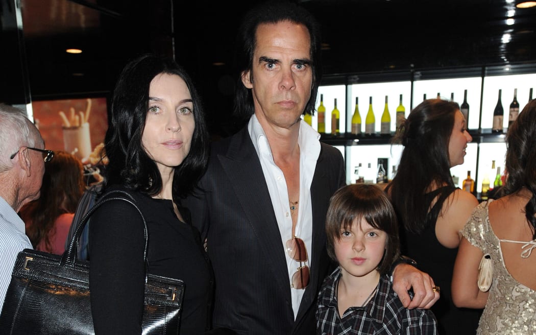 Musician Nick Cave and his wife Susie Bick with son Earl.