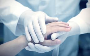 Hands of the doctor and patient