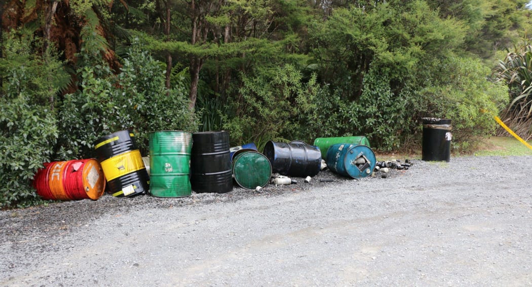 Oil barrels left at a carpark in the Waitakere ranges.