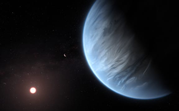 A handout artist's impression released on September 11, 2019, by ESA/Hubble shows the K2-18b super-Earth, the only super-Earth exoplanet known to host both water and temperatures that could support life. For the first time, water has been discovered in the atmosphere of a exoplanet with Earth-like temperatures that could support life as we know it, scientists revealed on September 11, 2019. (Photo by M. KORNMESSER / ESA/Hubble / AFP) / RESTRICTED TO EDITORIAL USE - MANDATORY CREDIT "AFP PHOTO /ESA/HUBBLE/M.KORNMESSER " - NO MARKETING - NO ADVERTISING CAMPAIGNS - DISTRIBUTED AS A SERVICE TO CLIENTS