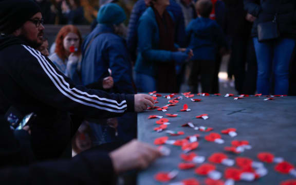 New Zealanders pay their respects at the dawn service at the Pukeahu National War Memorial Park.