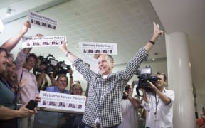 Al Jazeera journalist Peter Greste is warmly greeted by friends, family and media at Brisbane airport on February 5, 2015.