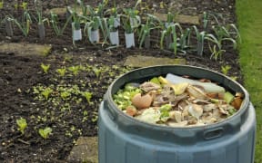 Garden compost bin for recycling kitchen food and garden waste including fruit and vegetable peelings, tea bags and egg shells.