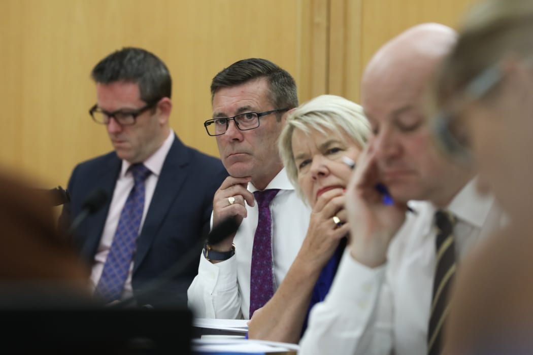 National MPs Michael Woodhouse and Nicky Wagner listening in Select Committee
