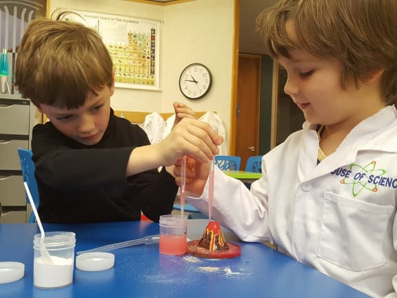 Two children doing a science experiment