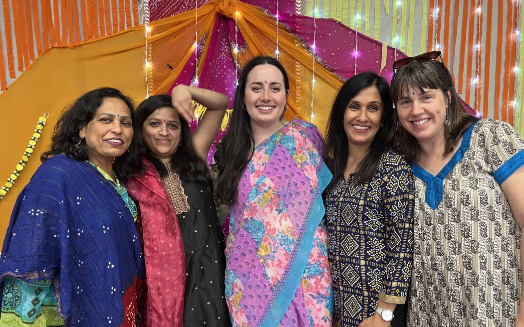 Zoe Miller (in the middle) handles the multicultural community engagement for Wellington City Libraries.