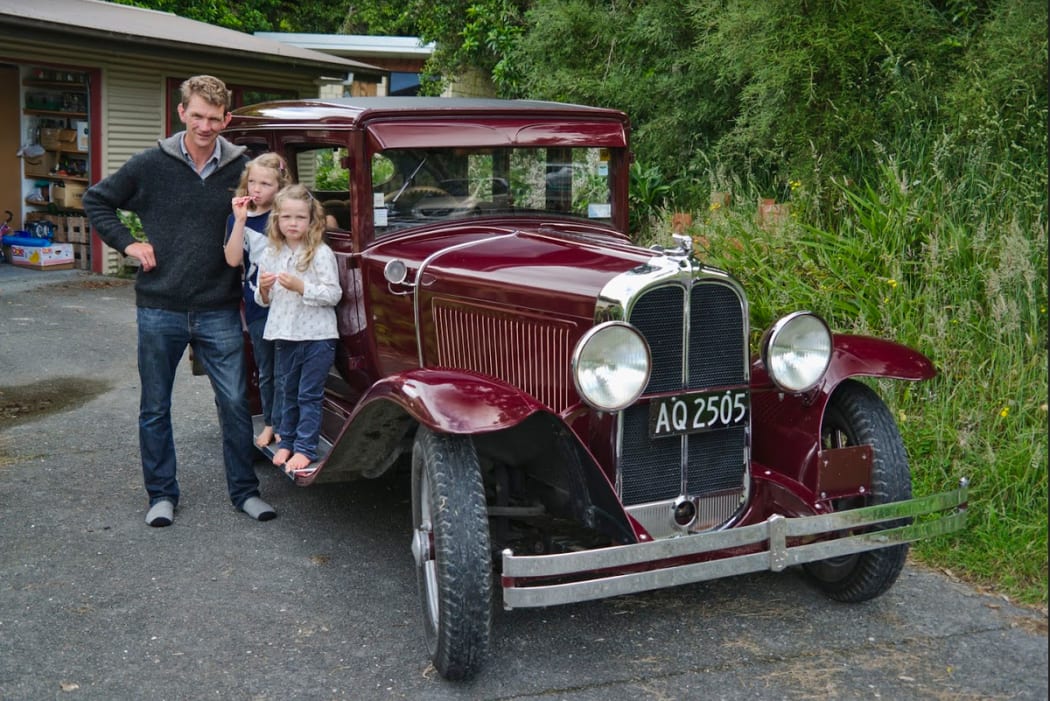 Kaikoura Beekeeper Daniel Milne with his children.