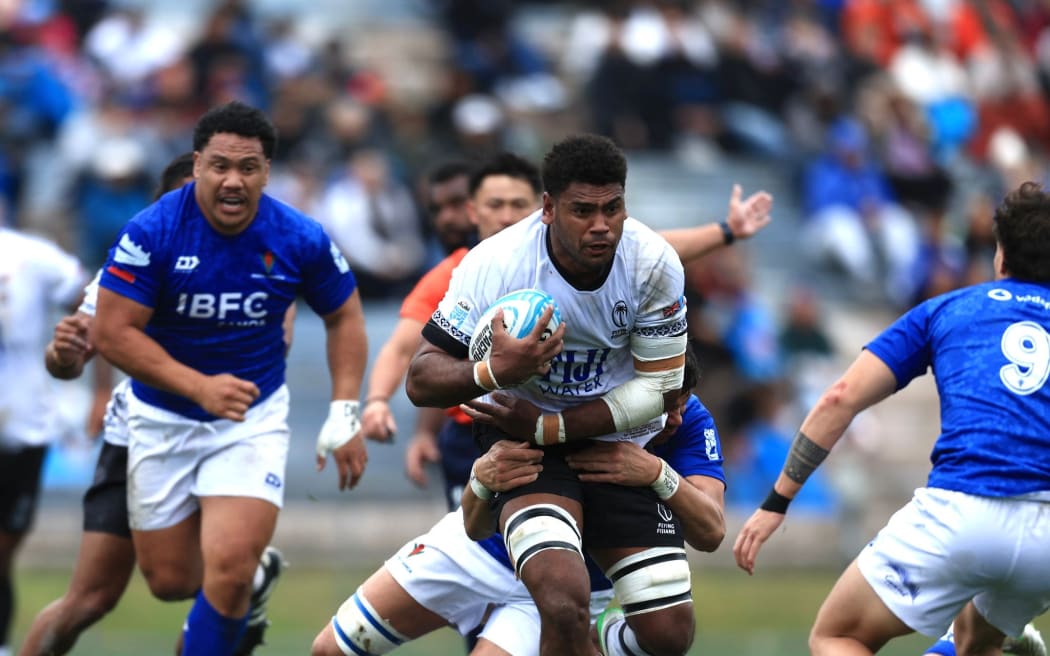 Fijian flanker Kitione Salawa on the attack for Fiji against Manu Samoa at the Rotorua International Stadium in this Pacific Nations Cup match on Saturday. Fiji won 29-15. Photo: Fiji Rugby