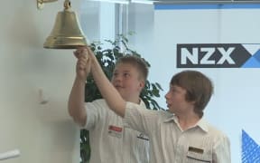 Students ring in Global Money Week at the NZX on 9 March 2015.