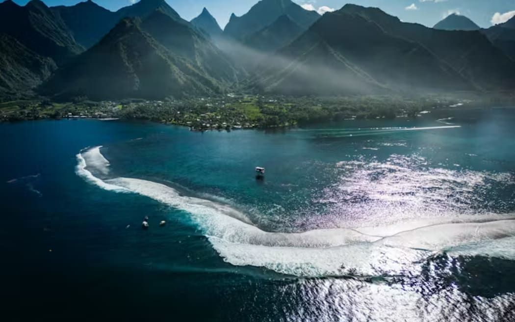 Olympic views: the surf break at Teahupo'o with Tahiti Iti in the background.