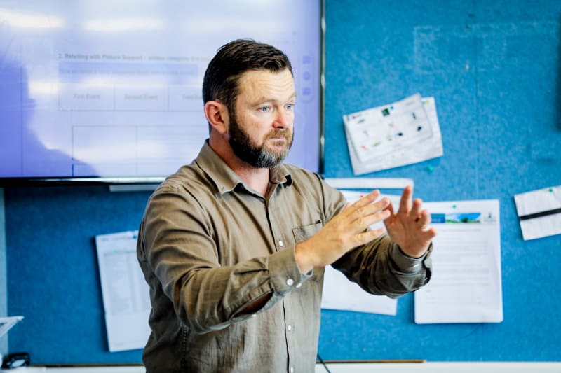 Phillip King, a teacher at Oranga School, working in the classroom that he leads with 9 and 10 year old students.