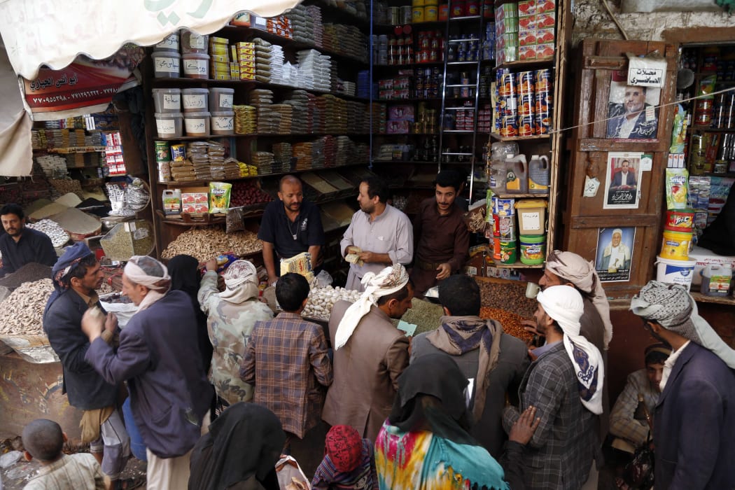 Yemeni people do shopping ahead of Muslims' holy month Ramadan at Al-Mih market, the oldest market in capital Sanaa, Yemen on March 31, 2022.