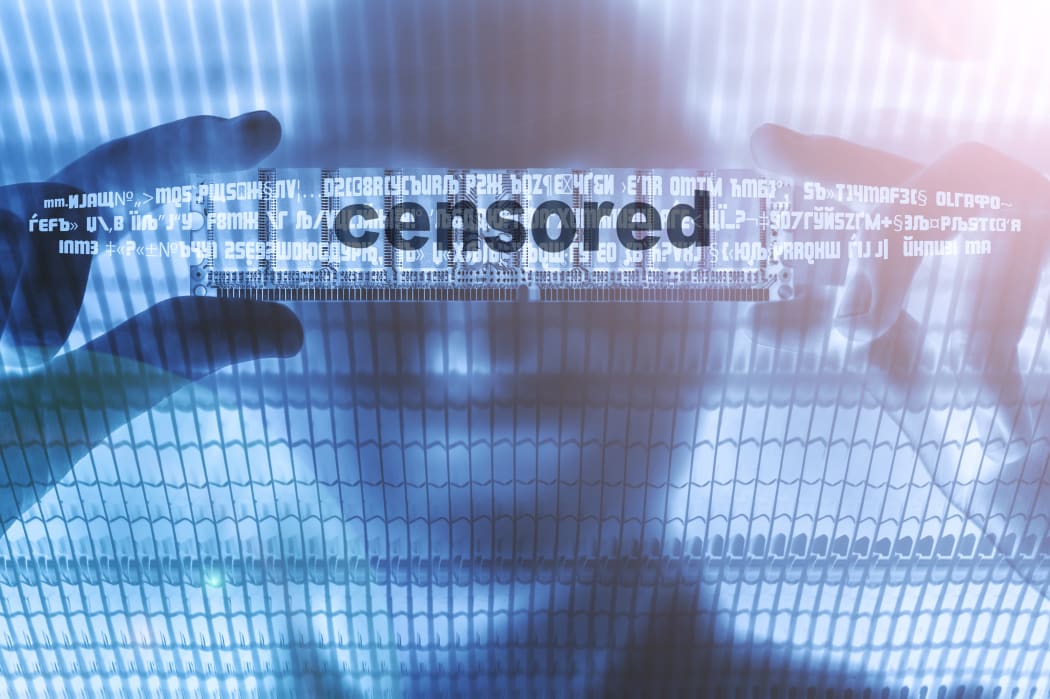 Anonymous person in digital space. Woman with not seen look and text "censored". Censor content with copy space. Blue background with IT technology. Virtual interface for human.