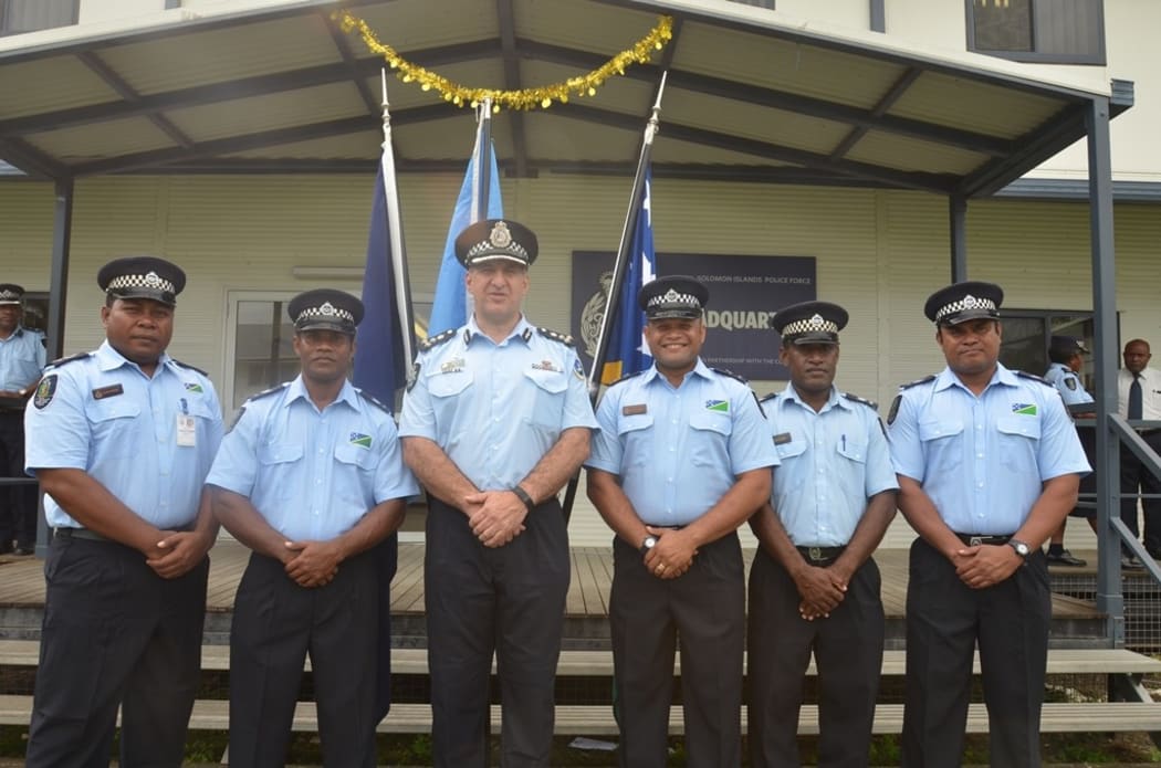 Solomon Islands police officers selected for deployment to the UN peace keeping mission in Darfur, with the RAMSI Participating Police Force Commander, John Tanti (3rd from left).