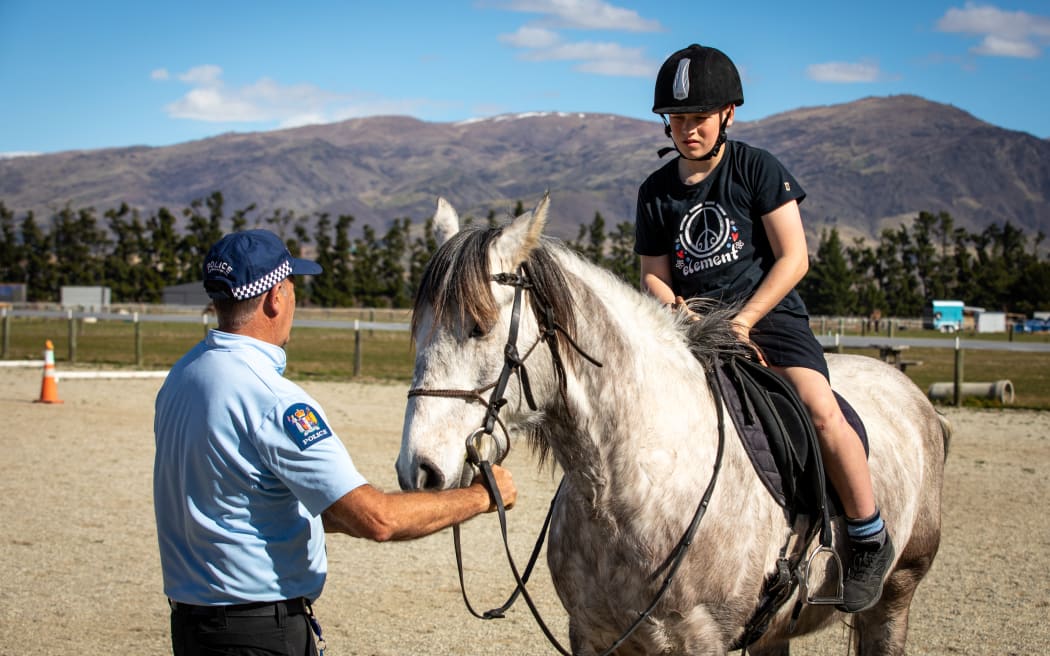 Constable Paddy Henderson puts kids through their paces during the Grab the Reins programme in Central Otago