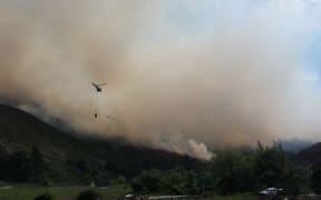 Nine helicopters were fighting the forest fire in the Waikakaho Valley by air on Wednesday 25 November 2015.