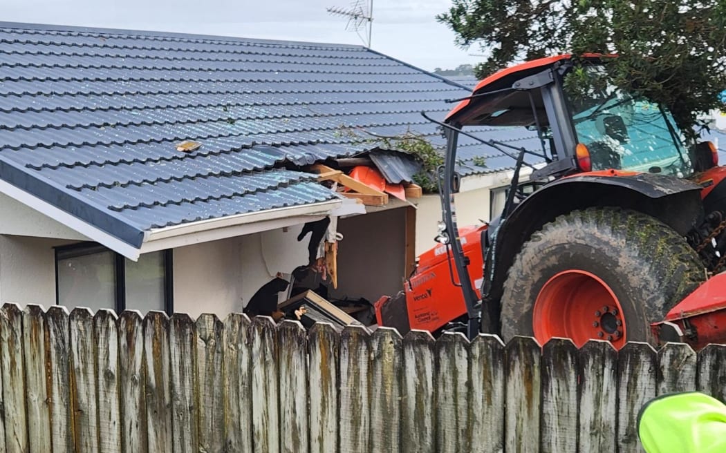 A tractor crashed into a house on Glenfield Road, North Shore, Auckland on 12 April 2023.