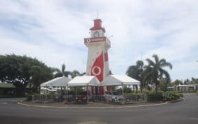 Clock tower in Apia, Samoa painted with logo of a telecommunications company
