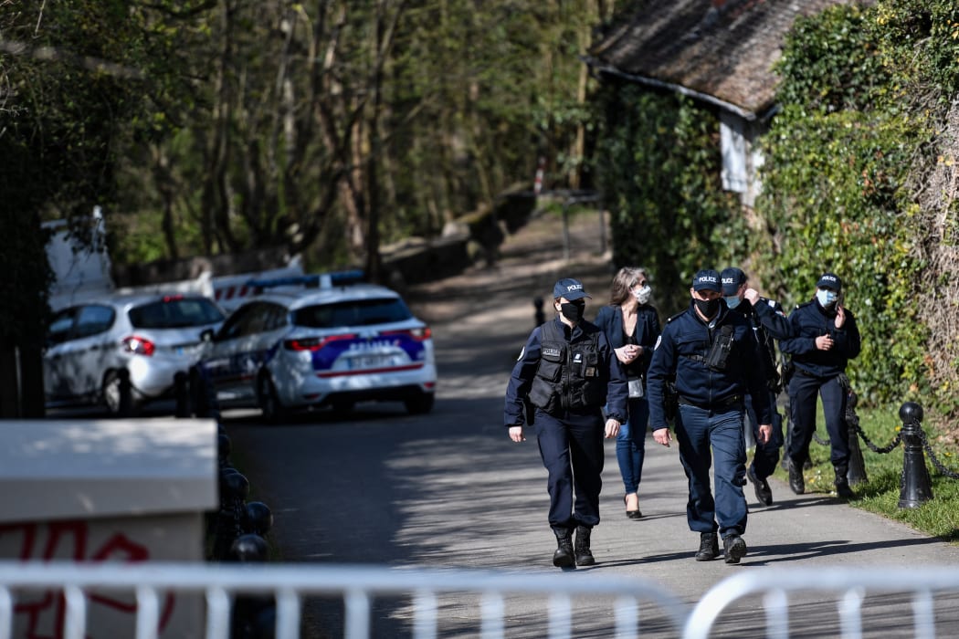 Police officers cordoned off an area near the house of French businessman Bernard Tapie and his wife Dominique Tapie in Combs-la-Ville, southeastern suburbs of Paris.