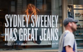 A window display of actress Sydney Sweeney is seen on a window of an American Eagle store on 1 August, 2025 in New York City.