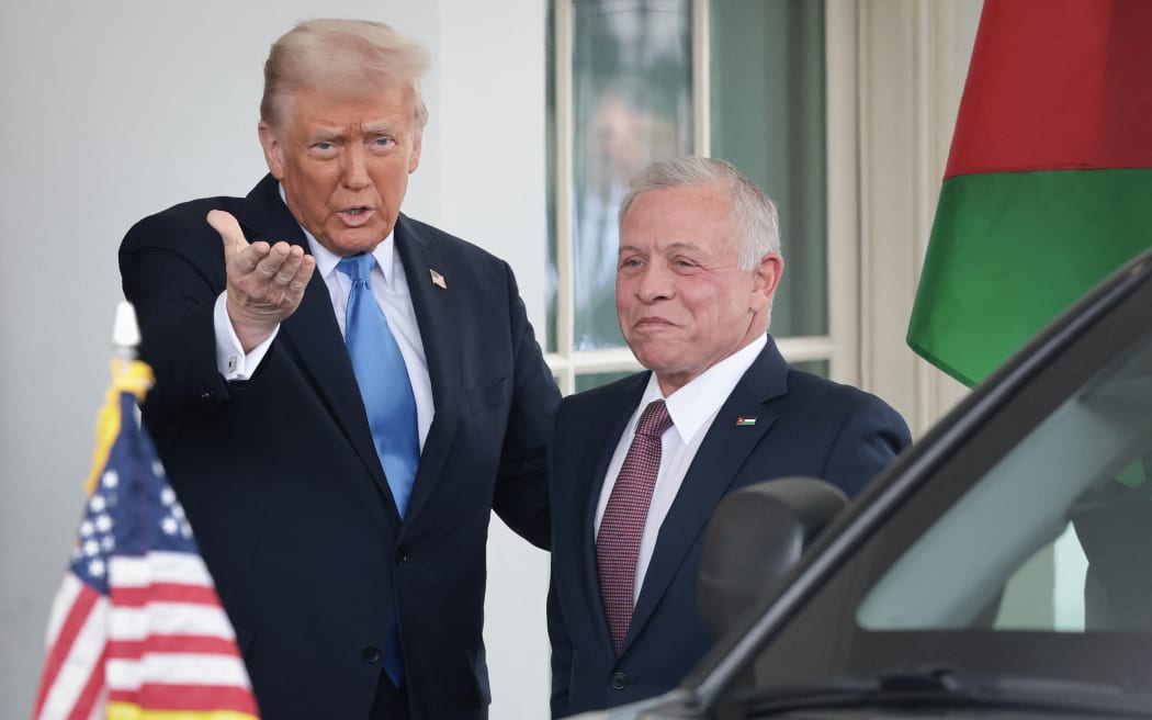 WASHINGTON, DC - FEBRUARY 11: U.S. President Donald Trump greets Jordan's King Abdullah II bin Al-Hussein (R) as he arrives at the White House on February 11, 2025 in Washington, DC. The meeting with King Abdullah comes as Trump has proposed that the United States take an ownership position of Gaza, transferring millions of Palestinians to neighboring countries as the area is rebuilt and developed.   Win McNamee/Getty Images/AFP (Photo by WIN MCNAMEE / GETTY IMAGES NORTH AMERICA / Getty Images via AFP)