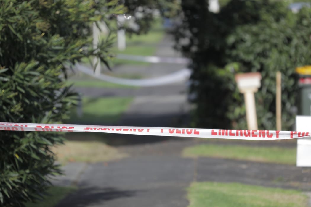 Police cordons on Central Avenue in Papatoetoe after a man wielding a machete was shot dead.
