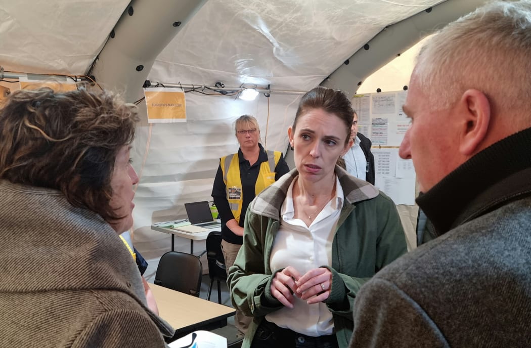 Prime Minister Jacinda Ardern speaks to NZ Defence Force members in Westport