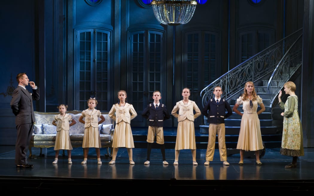 Fun-loving governess Maria (Bethany Dickson) at first encounters a stern Captain Von Trapp (Mark Rayment) and his children.